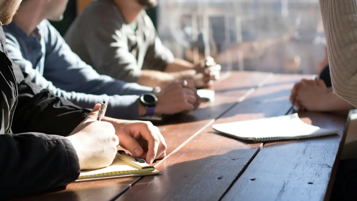 Bahrain Salary Guide 2026: Pay by Job, Benefits & Cost of Living Office team at work in Bahrain