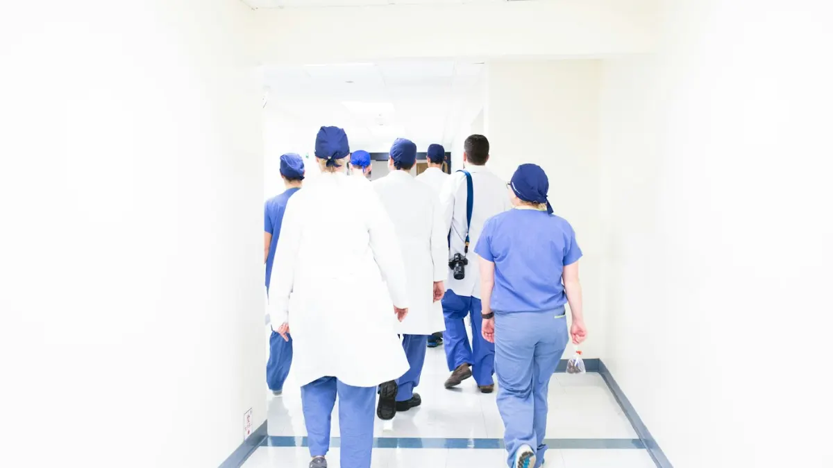 DHA Exam 2026: Eligibility, Sheryan Steps, DataFlow, Syllabus & Tips Doctors and nurses in a modern hospital