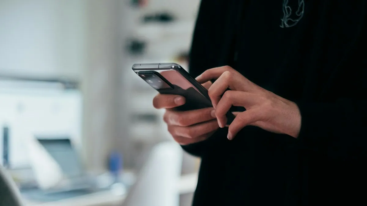 Job Scams in the Gulf: 12 Warning Signs to Avoid Fake Recruiters in 2026 Job scams – person holding a smartphone with a suspicious job message