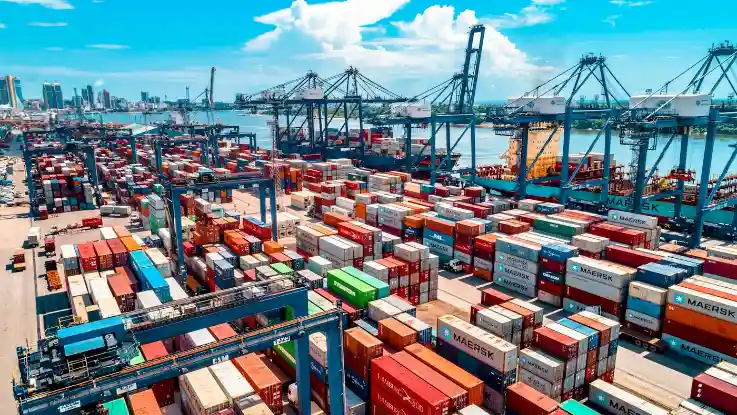 Heavy Driver Jobs in UAE 2026: Licence, Salary, Visa & How to Apply Container trucks at a busy logistics yard