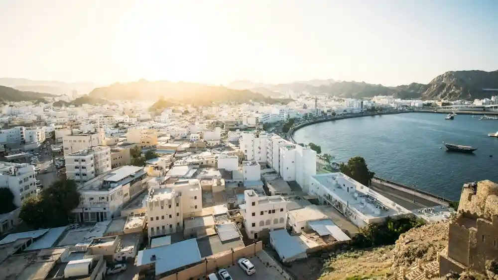 Muscat city at night – jobs in Oman for Indians