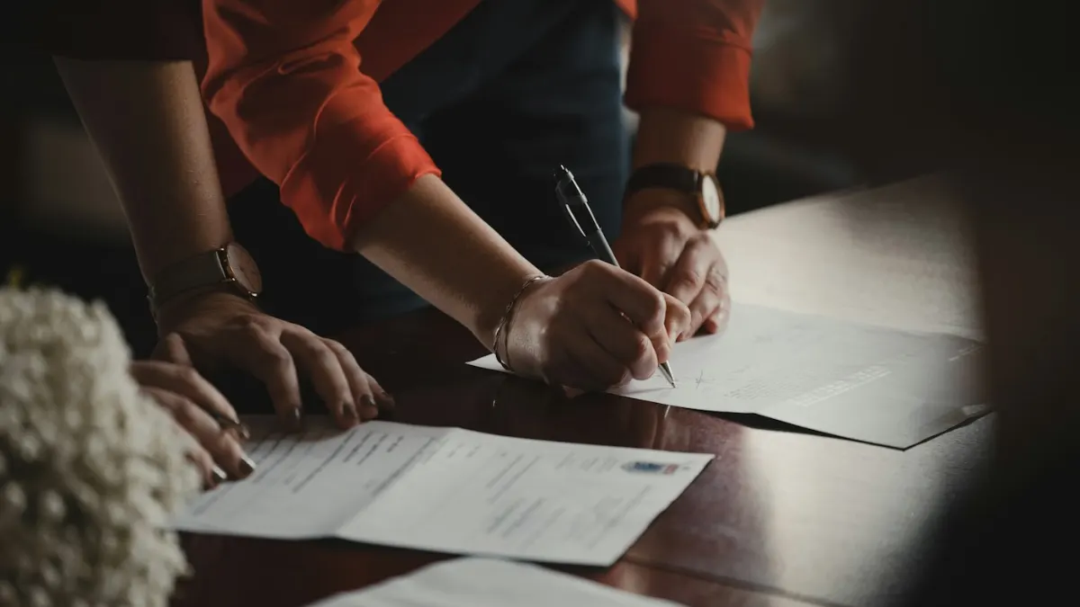 Professional signing an employment contract