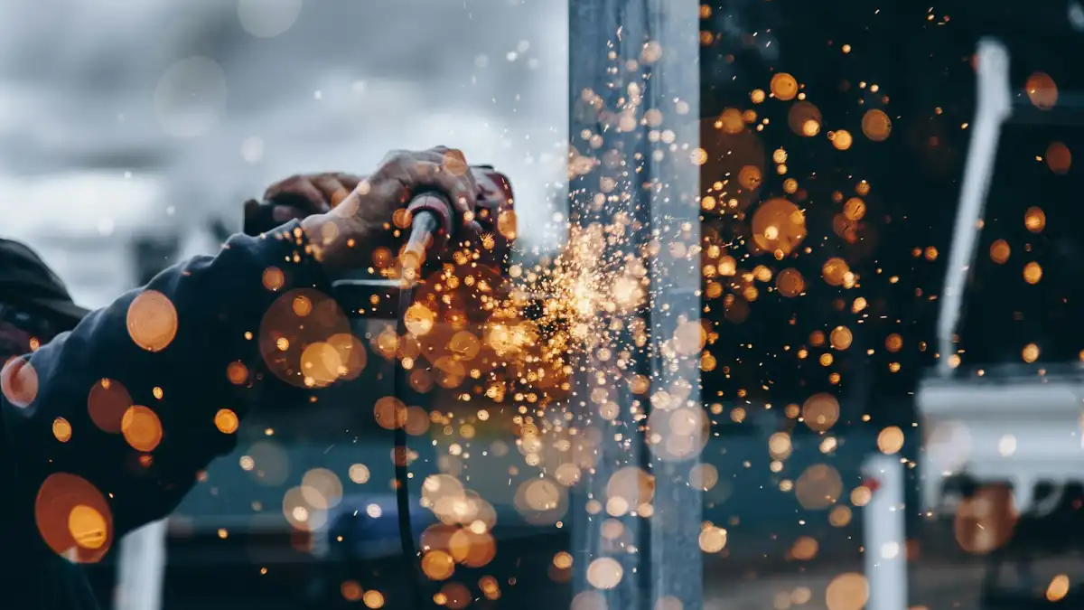 Construction worker tying steel reinforcement