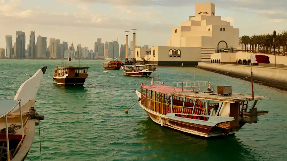 Traditional dhow boats in Doha bay – Qatar jobs