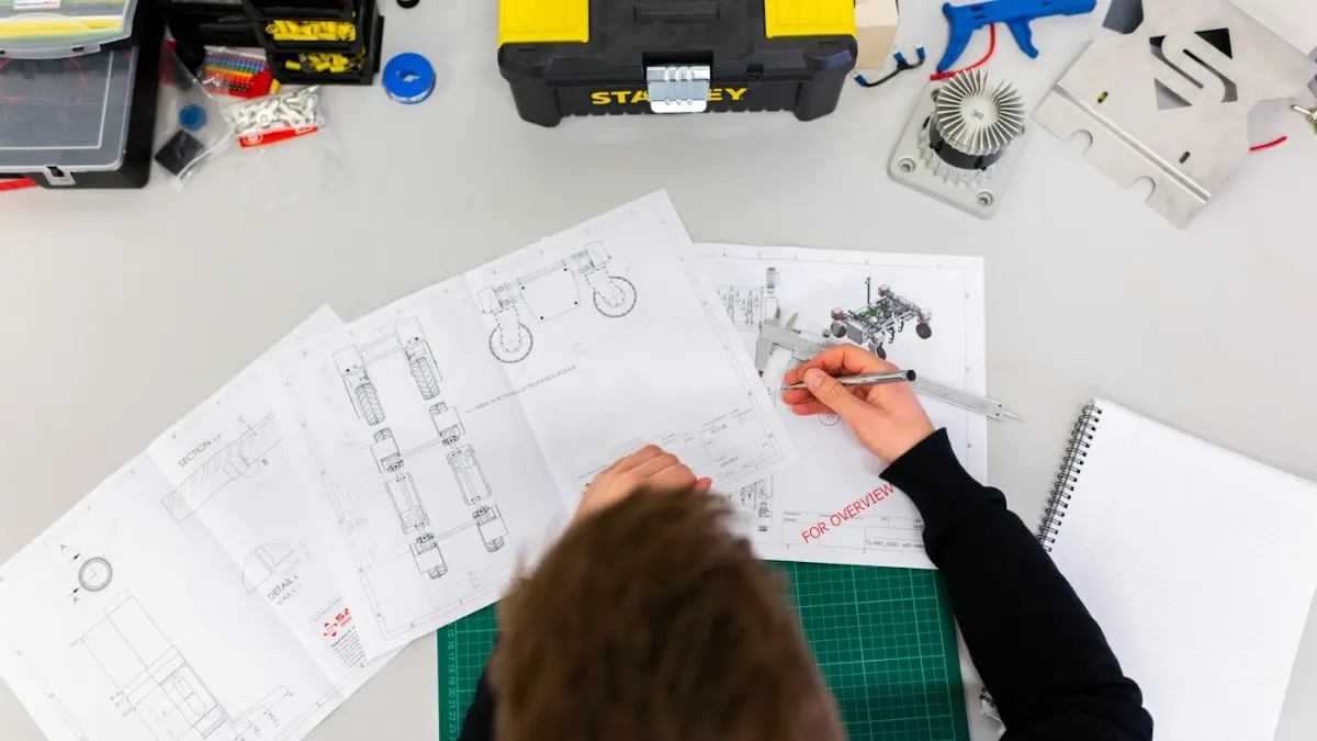 Engineer working on technical drawings