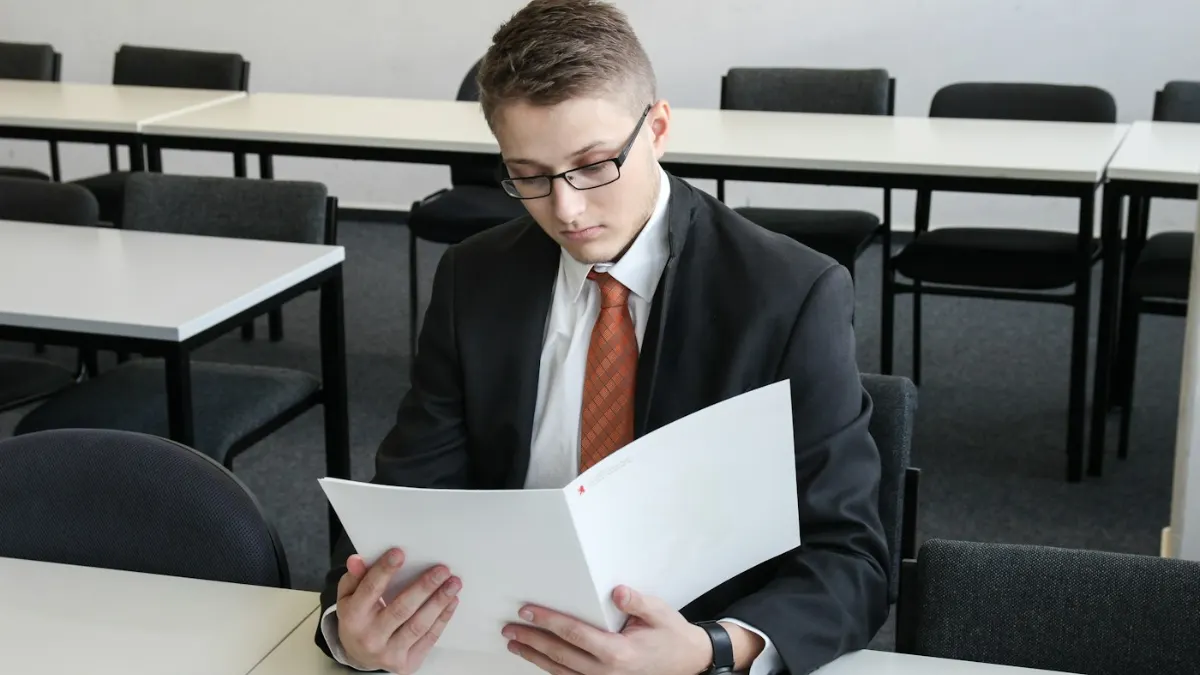 Employee checking payslip – end of service benefits in the UAE