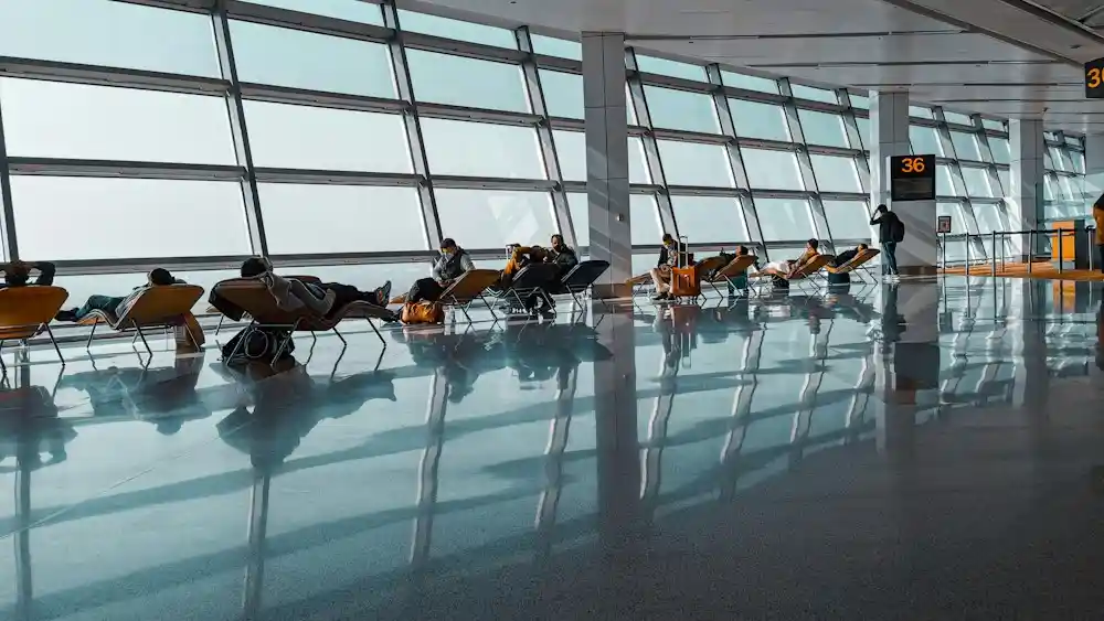 Visit Visa Job Search in UAE: 9 Smart Rules Before You Fly in 2026 Traveller with luggage – job seeker visa UAE